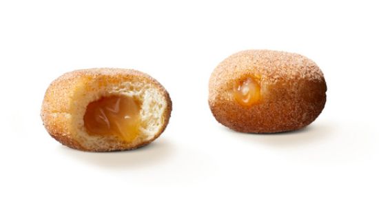Bild von Mini Beignet Apfel Zimt Füll. mit der Beschreibung Mini Siedegebäck mit Apfel Füllung und mit Zucker& Zimt bestreut.