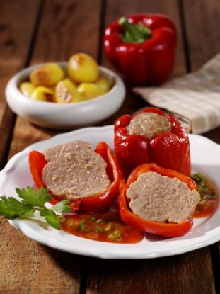 Bild von Paprikaschote Rot mit der Beschreibung Rote Paprika mit einer Füllung aus z.T. fein zerkleinertem Schweinefleisch, roh, tiefgefroren.